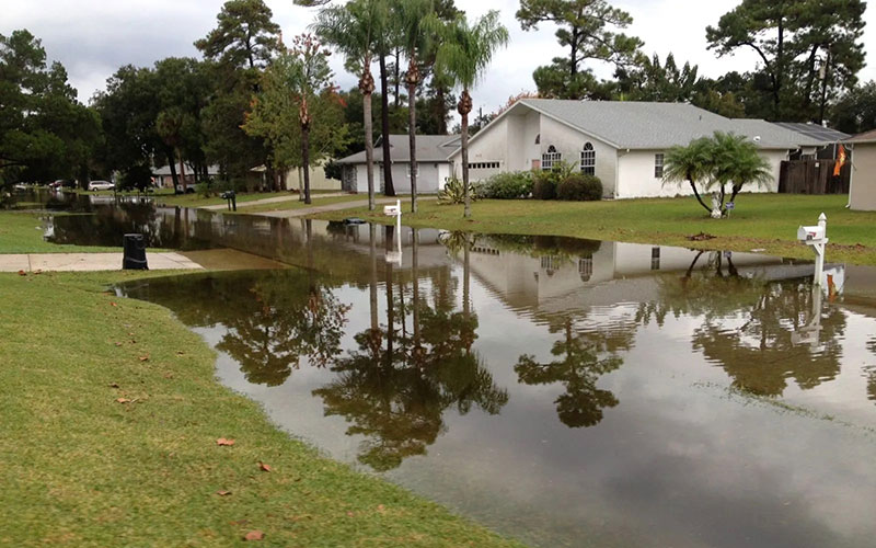 Flood waters in neighborhood photo